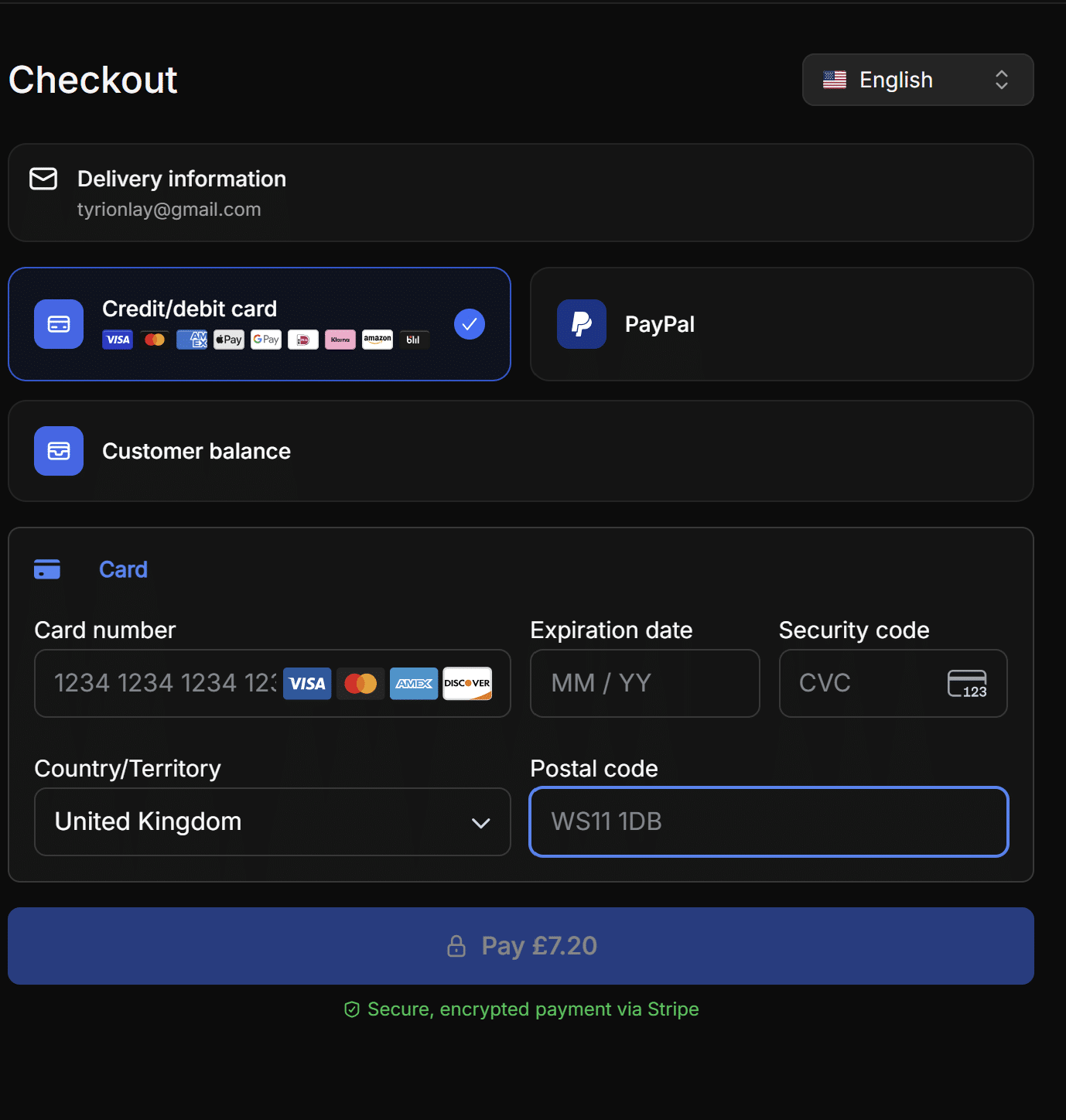Komerza secure credit and debit card payment form showing encrypted Stripe checkout